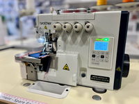 Machine à coudre surjeteuse industrielle à double aiguille et quatre fils à entraînement direct informatisée Brother FB-N21A