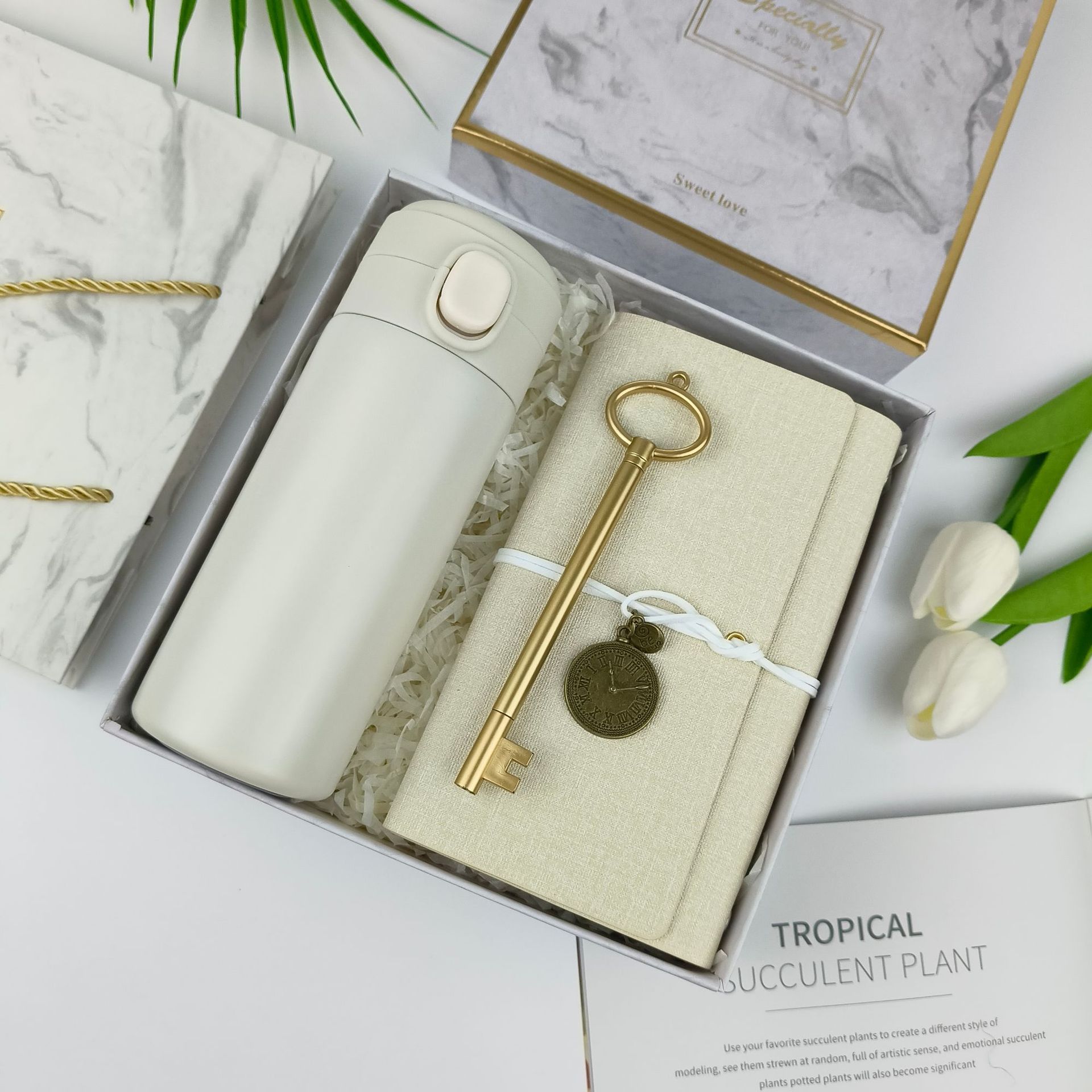 Vacuum flask + Notebook + Key pen