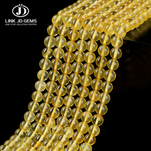 Perle di <span class=keywords><strong>Ambra</strong></span> Dorata Naturale Premium, Pietre Rotonde Traslucide Gialle Autentiche per Creazione di Gioielli Energetici Fai-da-Te - Product Image 1