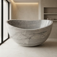 Baignoire autoportante en marbre, forme ovale, gris clair, rebord ondulé, pierre naturelle sculptée pour salle de bain et hôtel