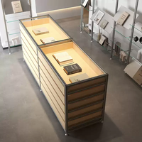 Vitrine d'îlot moderne en aluminium avec tiroirs multi-niveaux pour la maison, les boutiques, les bijouteries et les salles d'exposition