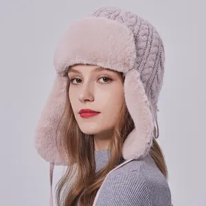 Женская трикотажная шапка-ушанка