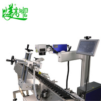 Machine de marquage laser automatique de haute précision avec module de positionnement rotatif à rouleaux pour la gravure laser sur bouteilles en verre rondes