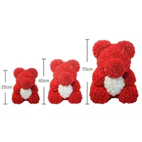 Meilleure vente : Ours en peluche rose artificiel avec fleurs en PE de 25 cm et boîte cadeau transparente