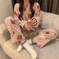 Ensemble de pyjama pour femmes en polyester thermique d'hiver, col rond, motif uni, manches longues, style doux et mignon, vente en gros