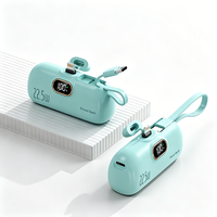 Batterie externe OEM de poche 5000 mAh 22,5 W à charge rapide, design mini-capsule, affichage numérique, support, chargeur portable, logo personnalisé