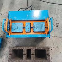 Nouvelle machine manuelle à pression QT pour la fabrication de briques de ciment avec moteur, pour blocs de pavage creux en mousse autobloquants