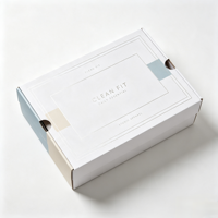 Boîte d'expédition en carton ondulé personnalisée avec motif géométrique coloré pour vêtements, accessoires et emballages e-commerce