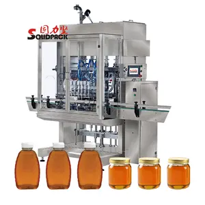 Solidpack pure honey bottle 4 heads pneumatic piston filler with heating hopper