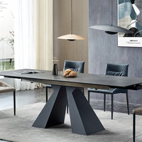 Table à manger minimaliste italienne en céramique revêtue de poudre noire avec deux panneaux d'extension à glissière de couleur marbre moderne extensible