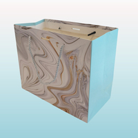 Sac cadeau de luxe exquis à motif de marbre Sac en papier commercial pour vêtements