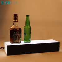 Présentoir à vin lumineux à trois niveaux en acrylique avec éclairage LED pour comptoir, fabriqué au Vietnam par DSP