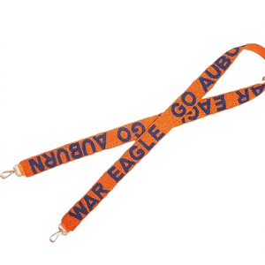 CRYSTAL CRAFT Correa de cincha naranja con texto en relieve azul 'Go Auburn War Eagle' Accesorio de bolso vintage, moderno y ecológico Modelo - Product Image 1