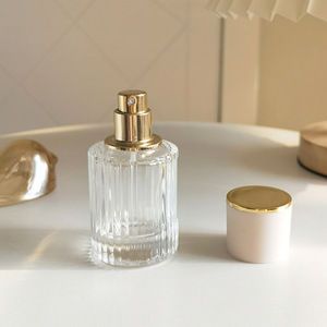 Spot wholesale 100ml perfume sub bottled transparent glass perfume <b>bottle</b> press <b>spray</b> <b>bottle</b> cut edge glass <b>empty</b> <b>bottle</b> - Product Image 3