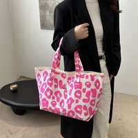 Nouveau sac fourre-tout tendance en toile grande capacité pour femme, motif léopard, style niche, à porter à l'épaule ou sous le bras
