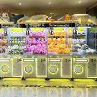 Prix d'usine à jetons en gros Grue à prix cadeau Machine Jouet en peluche Grue à griffes de vente automatique