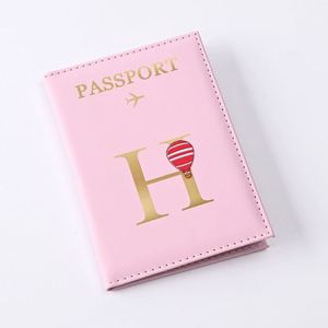 Pochette créative multifonctionnelle pour cartes d'identité avec fermeture à bouton, nouveau design, étui de passeport en PU, clip universel pour billets de voyage, format lettre - Product Image 1