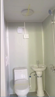 Toilettes mobiles préfabriquées écologiques au design moderne avec structure en panneaux sandwich et cuvette en céramique pour sites touristiques
