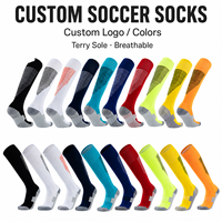 Chaussettes de football personnalisées montantes antidérapantes en tissu éponge respirantes pour l'entraînement des adultes – Vente en gros