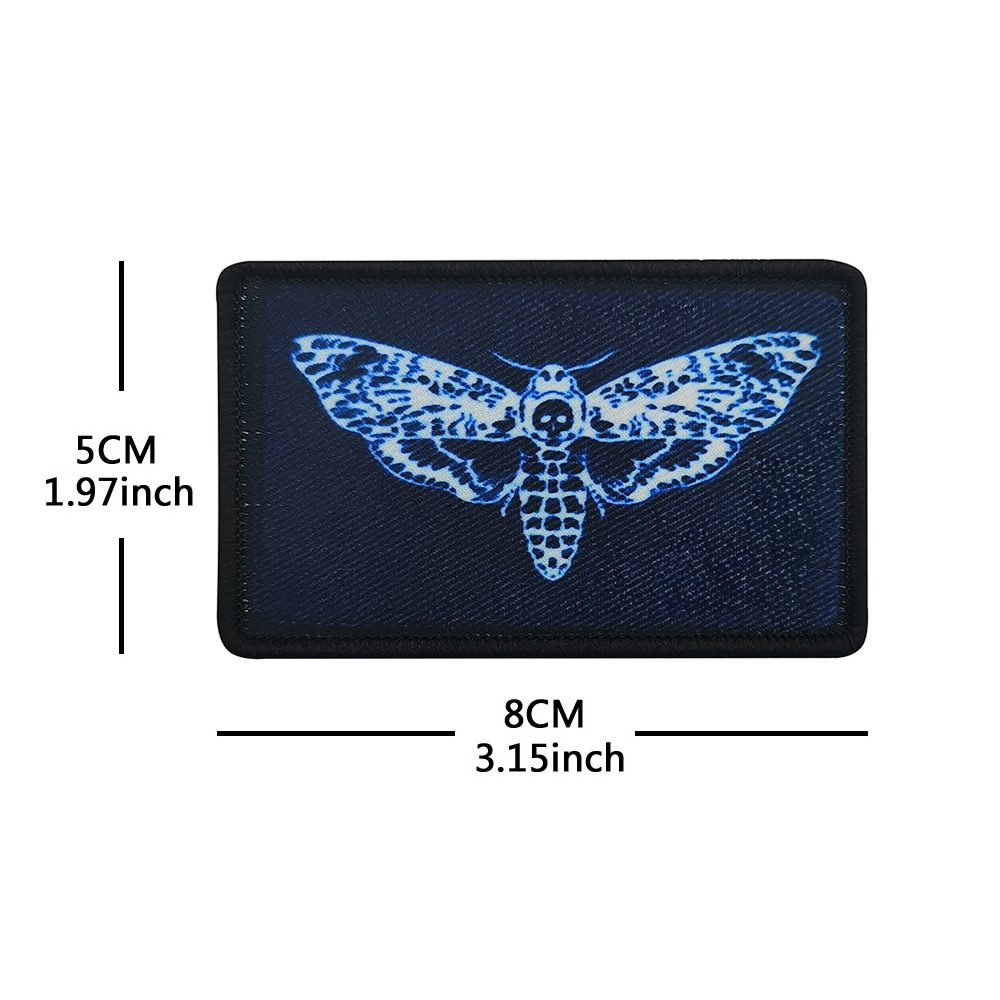 Y00122-1 Polilla estampada con alas de calavera (blanco y negro)