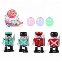 Cadeaux promotionnels bon marché, jouet amusant et mignon en forme d'œuf en plastique, mini robot dansant à manivelle, galaxie