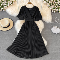 Nouvelle mode robe à manches bouffantes pour femmes robe décontractée à taille haute avec nœud de couleur unie col en V robes noires mi-longues trapèze pour femmes