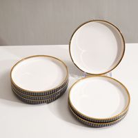 Service de table en céramique de luxe gris foncé, style européen, tasse à café accessible, assiette ronde pour un usage domestique, vaisselle élégante