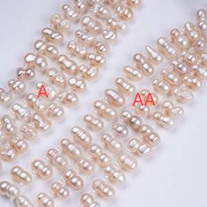 ไข่มุกธรรมชาติรูปทรงบาโรกสีชมพูขนาด7นิ้ว8-11มม. พร้อมไข่มุกน้ำจืดด้านข้าง - Product Image 1