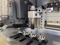 Routeur CNC haute vitesse et haute précision avec broche de 4 kW refroidie par eau et changement d'outil automatique, machine de découpe CNC 40000 tr/min