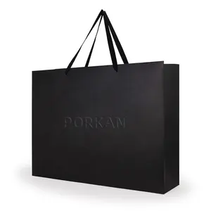 可重复使用的豪华黑色衣服手提袋定制零售包装礼品精品购物纸袋，带有您自己的标志商店