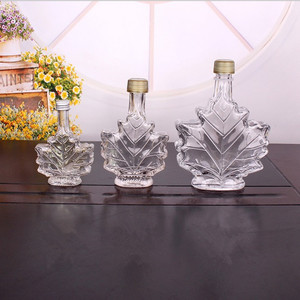 Bouteille en verre en forme de feuille d'<span class=keywords><strong>érable</strong></span> unique de 70 ml, 100 ml, 250 ml, bouteille de boisson en verre, bouteille de <span class=keywords><strong>rhum</strong></span> foncé avec bouchon <span class=keywords><strong>à</strong></span> vis - Product Image 5