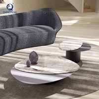 Table basse ovale à emboîtement avec plateau en marbre naturel et base en métal mat, style minimaliste pour salon de villa, vente en gros, usine OEM