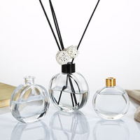 Vase en verre aromatique rond en relief de luxe de 200ml pour bouteille de diffuseur de roseaux dans divers styles pour la décoration de la maison
