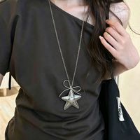 Collier long en acier inoxydable avec pendentif en résine nœud et étoile argenté, design audacieux et stylé, pour femme, haut de gamme, style Y2K sportif