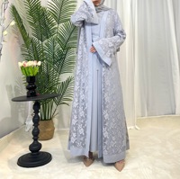 À la mode 2024 élégante Robe musulmane dentelle fleur fête manches évasées Robe Abaya musulman Cardigan deux pièces ensemble