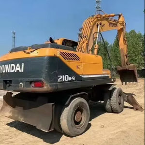 Excavatrice sur pneus Hyundai 210W-9 d'occasion de haute qualité, moteur Cummins, modèle 2015, capacité de la cuve de 1,3 m, composants principaux inclus - Product Image 1
