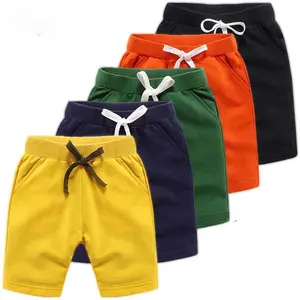 Yaz moda spor çocuk kısa Sweatpants pamuk erkek katı elastik bel kızlar çocuklar için özel LOGO plaj şortu