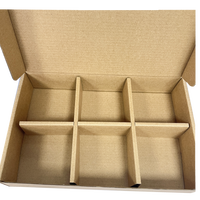 Boîte d'expédition en papier kraft écologique avec inserts de séparation pour l'emballage de détail du commerce électronique et la livraison en toute sécurité