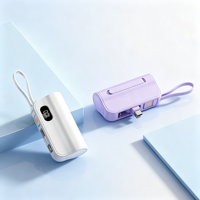 Batterie externe mini capsule 5000 mAh, avec câble intégré double embout, affichage numérique et support de téléphone portable