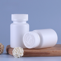 Flacon de pilules en HDPE de qualité médicale avec bouchon à vis 120ml/150ml en plastique blanc mat pour médicaments, sérigraphié