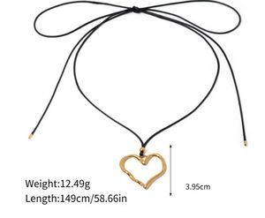 Collar Ajustable de Acero Inoxidable y Oro de 18k con Corazón Grande y Cordón Negro de Alta Calidad - Product Image 1