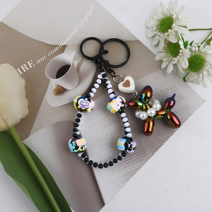 Dây buộc điện thoại cao cấp cổ tay sang trọng thời trang tay đính cườm chuỗi trang sức túi quyến rũ Bóng chó Keychain nhựa acrylic vòng chìa khóa - Product Image 1