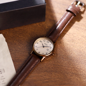 Reloj minimalista para mujer, reloj de cuarzo retro de alta gama con correa de cuero redonda, venta al por mayor - Product Image 2