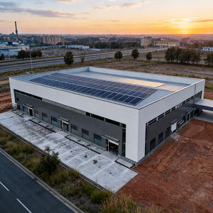Entrepôt préfabriqué en structure métallique à hauteur personnalisable, atelier de stockage en métal réglable, surface galvanisée, durée de vie de 50 ans - Product Image 1