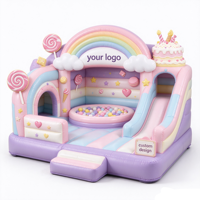 Château gonflable sur le thème des bonbons et des gâteaux avec toboggan et piscine à balles, château gonflable commercial pour les fêtes d'anniversaire des enfants, location pour événements