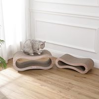 Lit de repos et griffoir pour chat 2-en-1 Infinity en carton moderne de 26 pouces avec herbe à chat pour chats d'intérieur