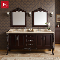 Meuble-lavabo double vasque en bois massif de style américain traditionnel Happy Houses, avec armoire sculptée et comptoir en marbre, idéal pour villas et hôtels