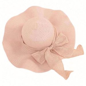 Sombreros de verano para mujer al por mayor, sombrero de sol de paja de papel barato para playa, sombrero de cubo de ala ancha con cinta - Product Image 4