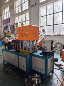 เครื่องขึ้นรูปห่วงเหล็กแผ่นอัตโนมัติพร้อมระบบเจาะและตัดในตัว - Product Image 2