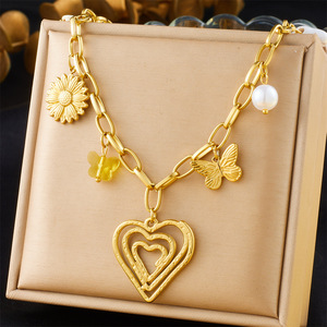 Collar Largo de Acero Inoxidable Dorado Unisex con Colgante en Espiral de Corazón, Cristal, Mariposa y Flor para Fiesta - Product Image 5